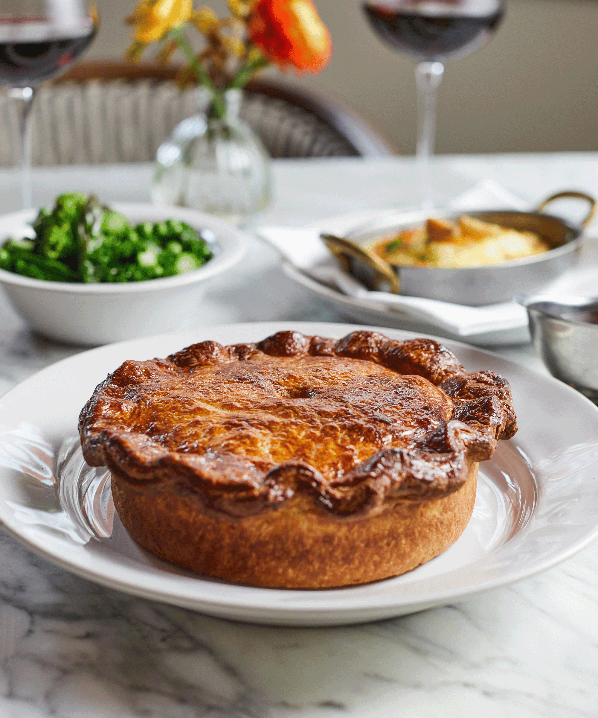 Chicken and rabbit pie to share for 2 - Creamy Chicken, Wild Devonshire Rabbit, Smoked Bacon & Leek Pie, served with Miso Greens, Baked Mash and either a red wine sauce or mustard and shallot sauce